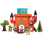 Front of the Playper Castle.  Drawbridge is down with the queen standing in the door.  A knight on a horse, dragon, and king are standing outside with trees and bushes.  A troll is standing on a balcony, and the princess is peeking out the window in the top tower.  