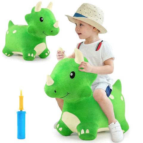 Adorable child wearing a fedora style hat bouncing on the green Bouncy Triceratops!  Inflation pump shown to the side. 