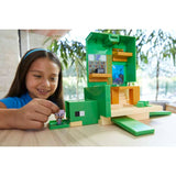 Young child playing with the Transforming Turtle Hideout playset, taking Steve into the hideout through the secret entrance in the turtle's mouth.