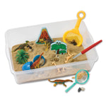 Play scene setup showing the discovery elements placed around in the sand filled bin.