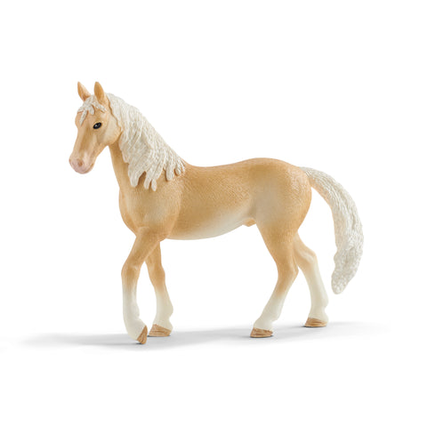 Model of Akhal-Teke stallion from the left.  Left front hoof is raised.  Coloration is a light tan with white ends of legs and a white mane and tail.  