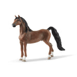 Model of American Saddlebred Gelding rom the left side.  A dark brown color coat with white coat down near the hooves.  Very dark brown to black mane and tail.  