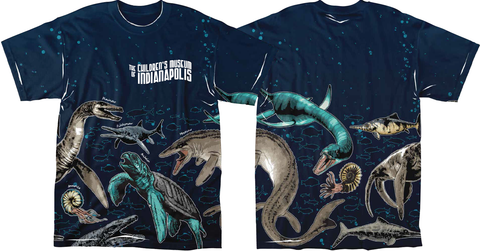 Sublimated tee shirt with dark blue background and prehistoric undersea creatures like Ophthalmosaurus, Mosasaurus, Plesiosaurus, Archelon, and Ammonites.