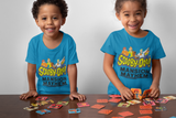 Two siblings playing a matching card game, wearing Scooby-Doo! Mansion Mayhem tee shirts.
